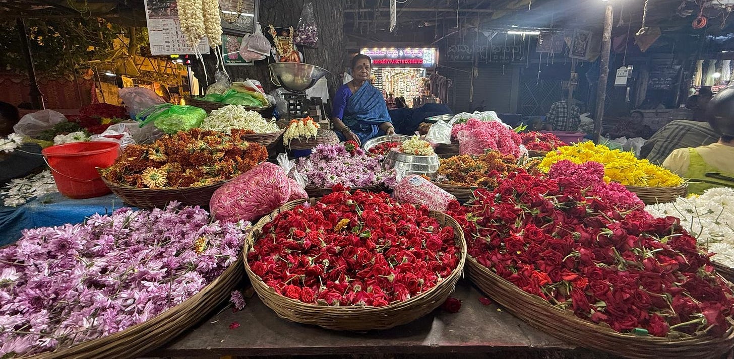 vendor selling loose flowers in the market vendor selling loose flowers in the market