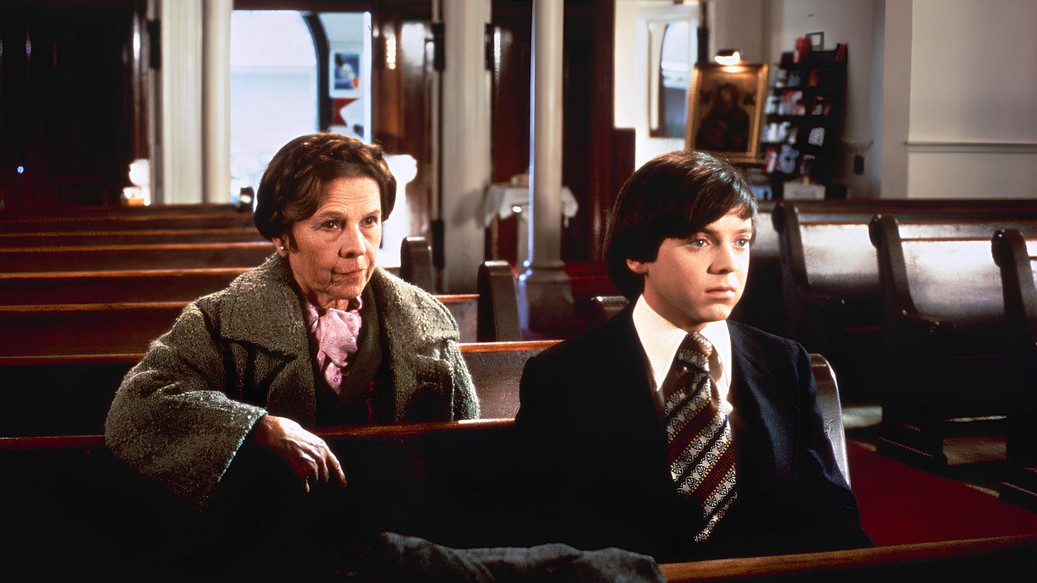 Harold and Maude | Still features Ruth Gordon as Maude and Bud Cort as Harold in a church.