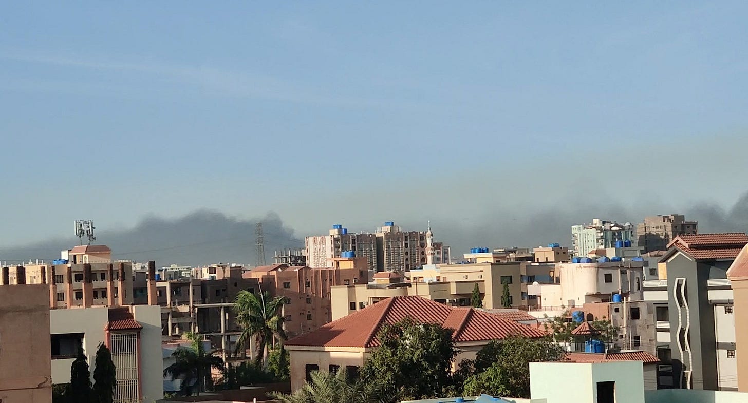 A general view shows a cloud of smoke in Khartoum A general view shows a cloud of smoke in Khartoum