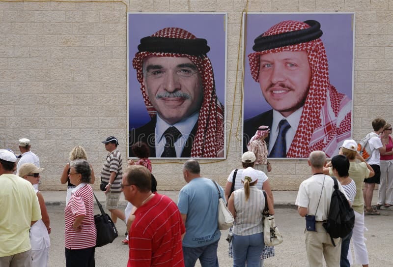 A group of people looking at pictures of a person

AI-generated content may be incorrect.