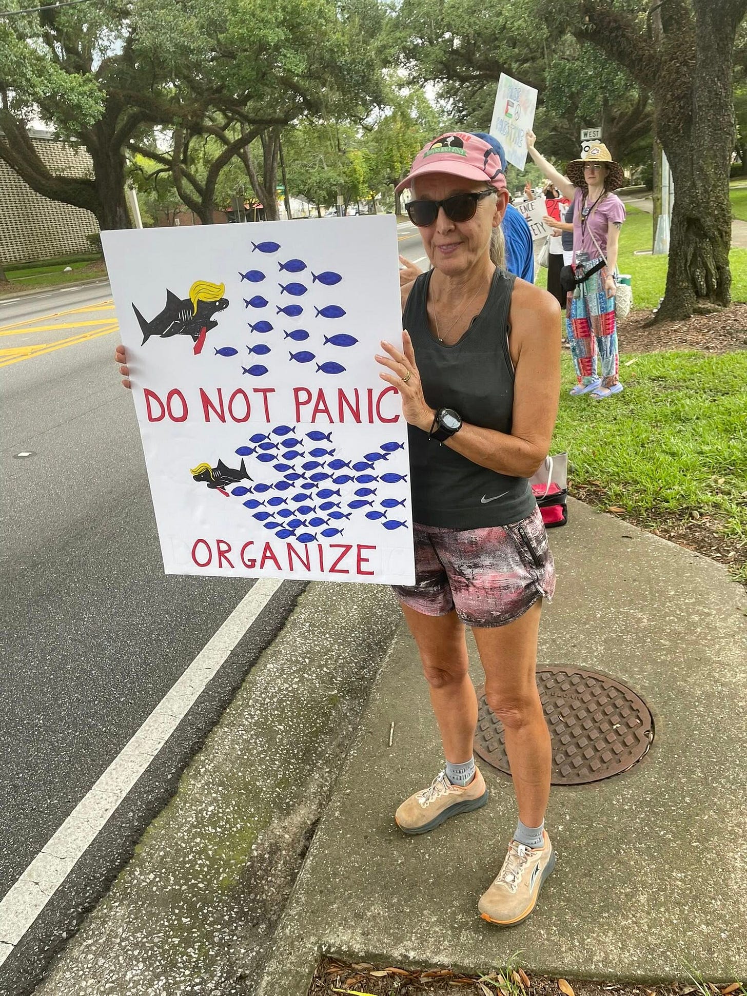 May be an image of 2 people and text that says '国 DONOT_PANIC DO NOT PANIC ORGANIZE'