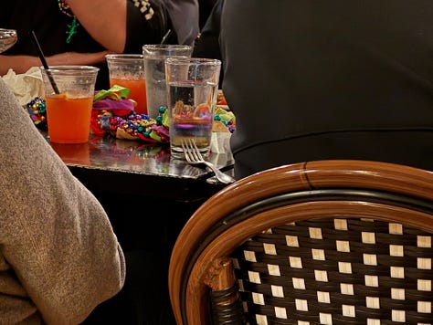 Various images of Mardis Gras at Rabalais' Bistro.