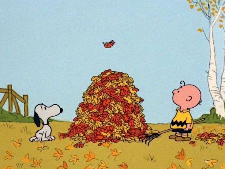 This may contain: a charlie brown thanksgiving scene with snoop and his dog in the fall leaves, while a bird flies overhead