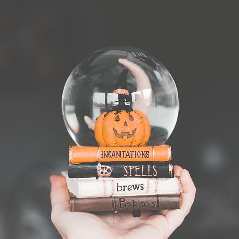 Close-up of a multichannel pipette filling a 96-well plate with pink liquid, symbolizing scientific experiments.  Top view of a desk with a computer, coffee, and printed charts showing graphs and data analysis, representing LinkedIn metrics.  Hand holding a Halloween snow globe with a pumpkin and stacked books labeled “incantations,” “spells,” “brews,” and “potions,” symbolizing the myths and “magic” often tied to social media algorithms.