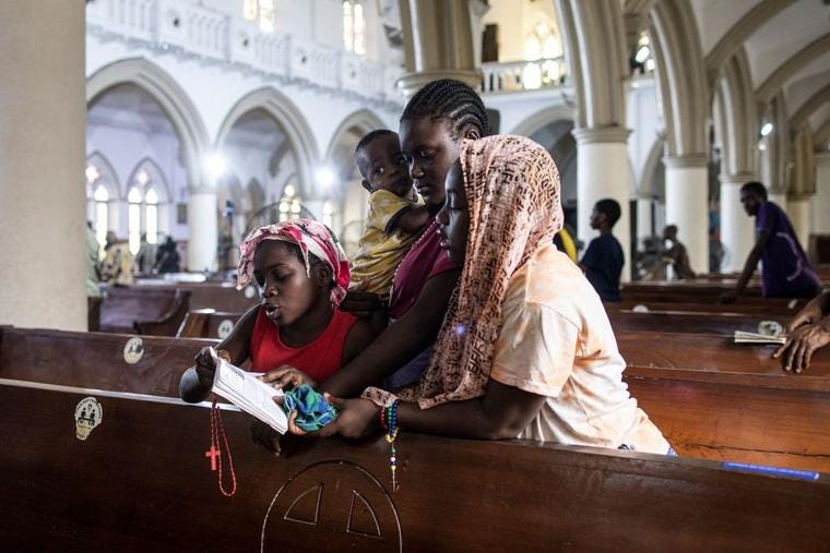 Catholic worshippers take part in the Stations of the Cross pat the Holy Cross Cathedral in Lagos on February 24, 2023.