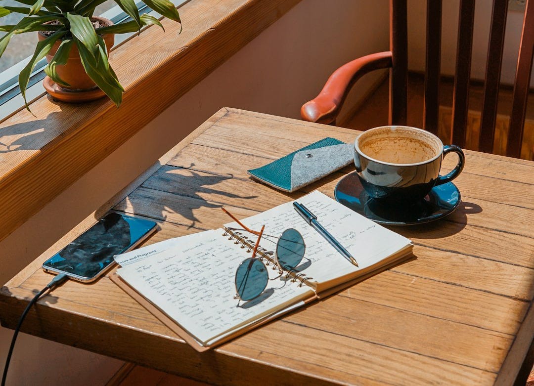 green leafed plant near table green leafed plant near table