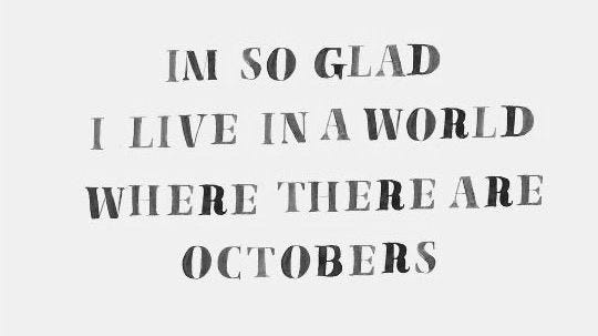 This may contain: a quote that reads in so glad i live in a world where there are octobers