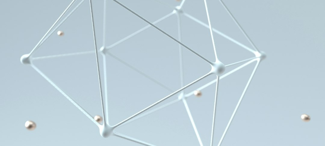 a white antenna with many small balls