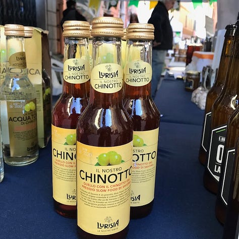 Pictures of cheese, lemons, Buddha's Hand citrus, bottles of chinotto and views of the town.