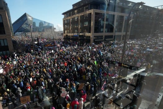 Thousands protest in downtown Minneapolis against the presence of federal immigration agents.