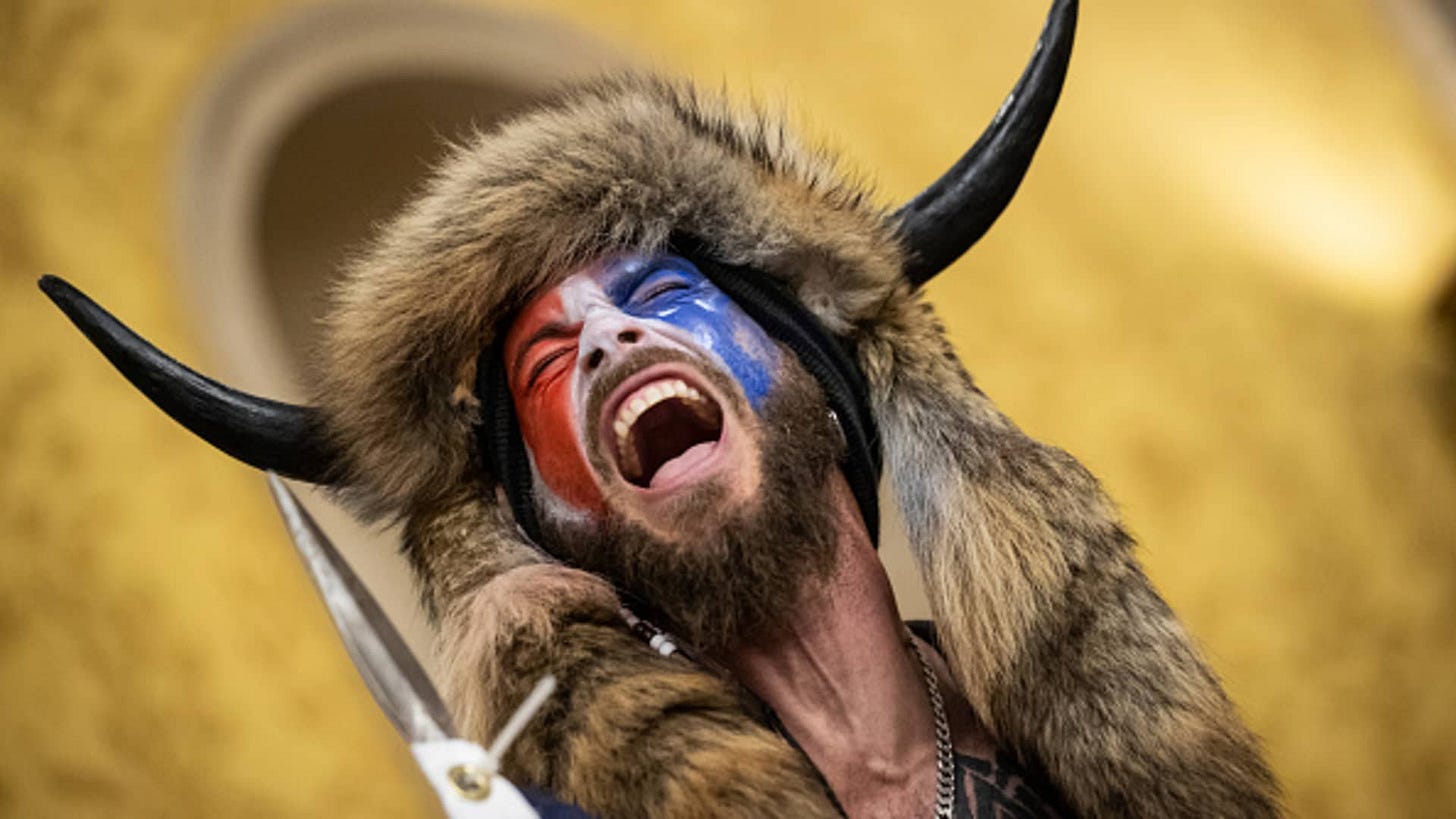 Judge orders DOJ to return QAnon shaman Jacob Chansley spear, helmet