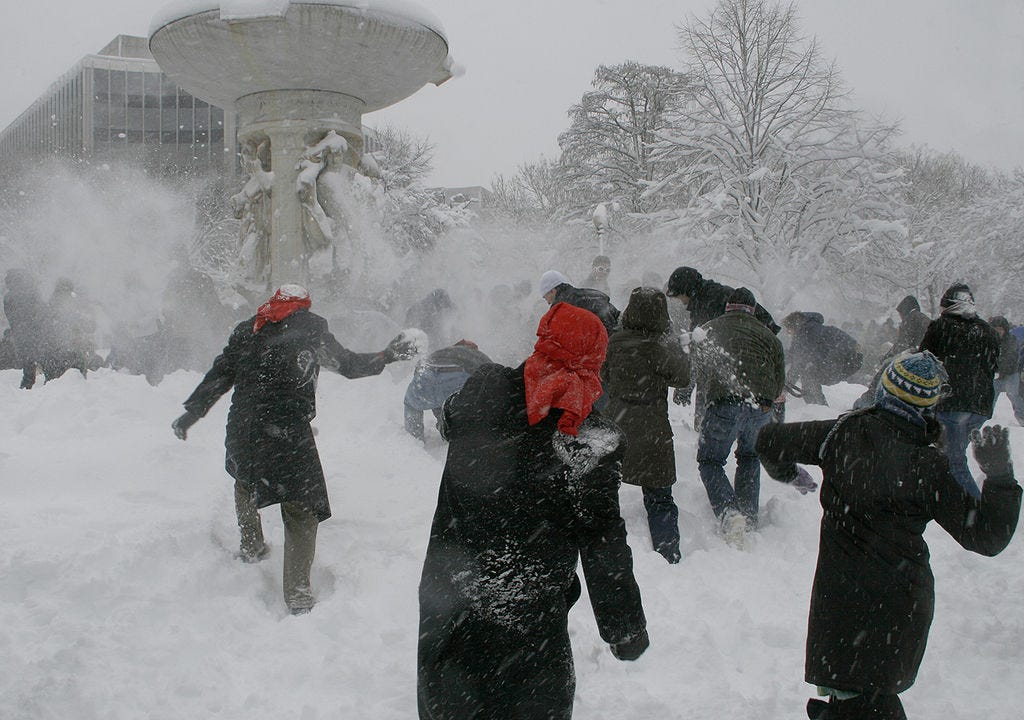Picture of a snowball fight at the Dupont Circle fountain, located at the center of Dupont Circle in Washington, D.C., following the First North American blizzard of 2010.