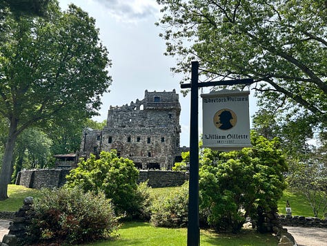 buildings, signs, sky, water