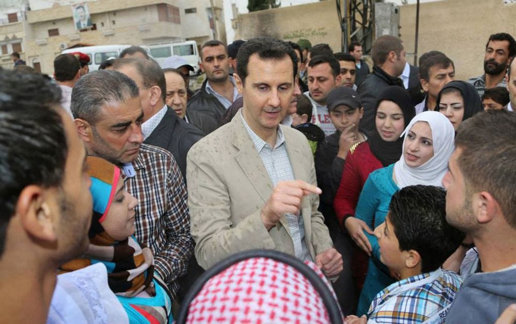 Syria's Assad pays Easter visit to old Christian town | AFP News Agency Syria's Assad pays Easter visit to old Christian town | AFP News Agency