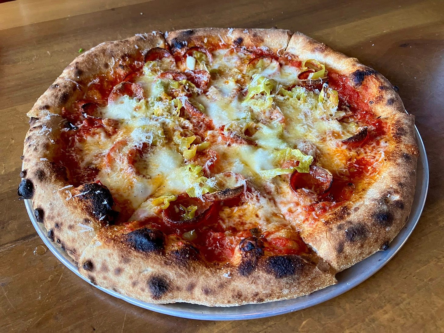 May be an image of pizza