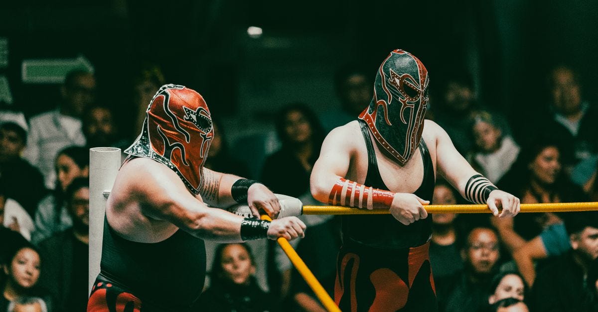 Photo: Amar Preciado / Pexels Masked wrestlers compete in an exciting Lucha Libre match before an engaged audience.
