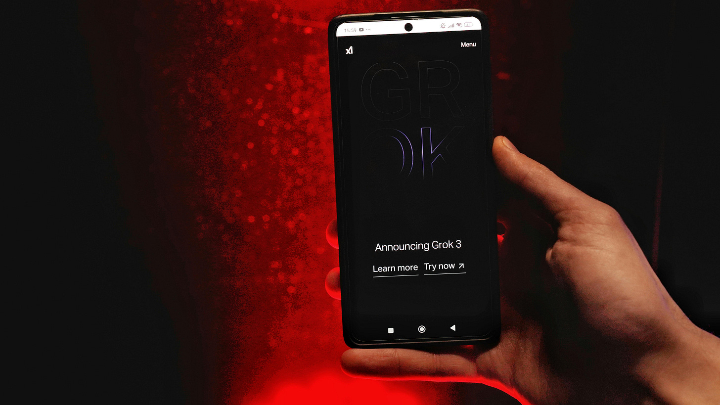 Hand Holding Smartphone with Grok 3 Announcement · Free Stock Photo
