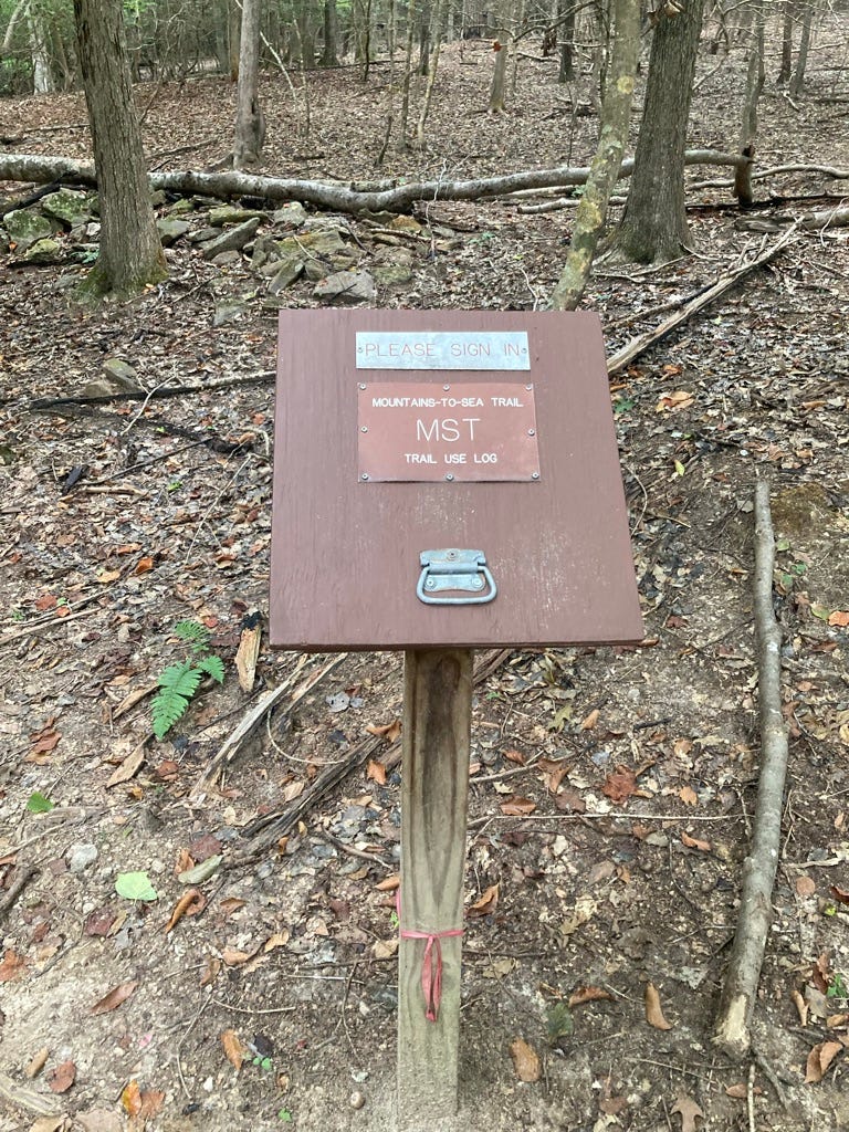 sign saying Please Sign In: Mountains-to-Sea Trail