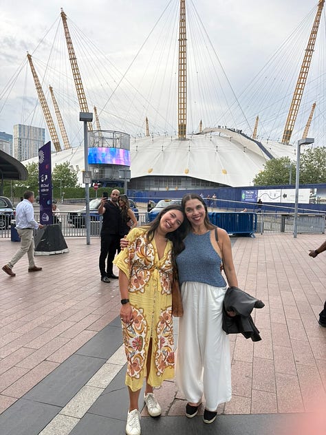 two women in front of the O2 arena; a woman in front of Keats House in Hampstead, two women in front of the Royal Opera House in London; the inside of the Royal Opera House in London; tower bridge at night; a picnic in the park