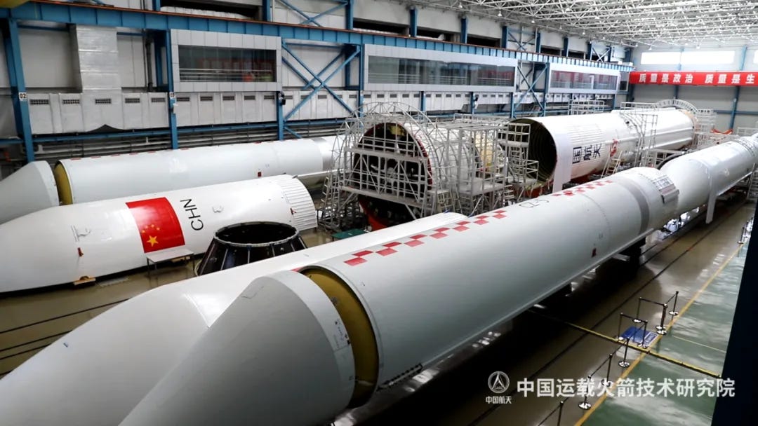 The Long March 5 Y11 vehicle’s boosters, first-stage, second-stage, and fairing prepared ahead of integration at the Wenchang Space Launch Site.