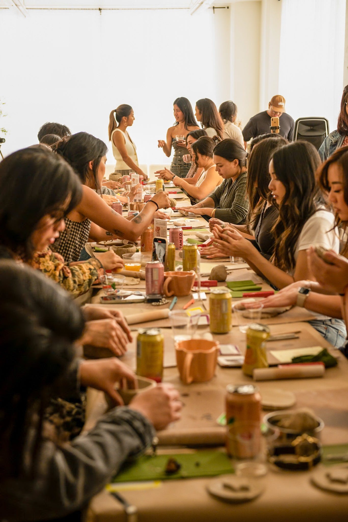Dining Table surrounded by women Dining Table surrounded by women