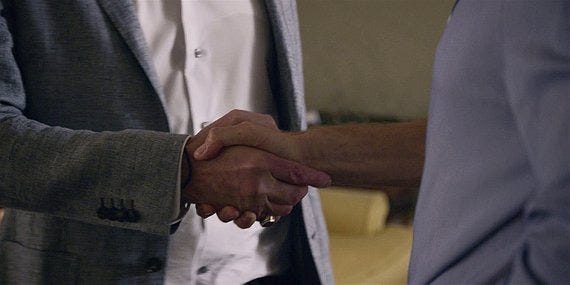 Walker close up on Stan shaking hands with LIam about campaign. Walker close up on Stan shaking hands with LIam about campaign.