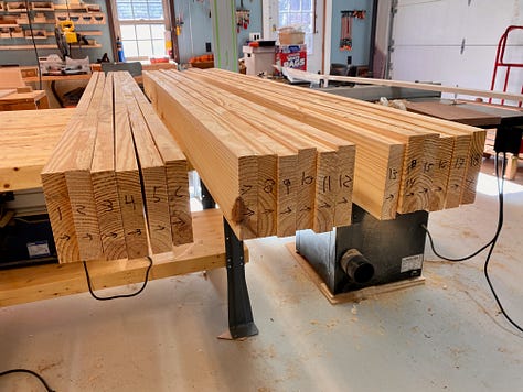 Gluing up the top: Ordering boards, rolling on glue, clamping, a gap opens, trying to close the gap, creating space for a planing stop, more gluing up, popping out the placeholder.