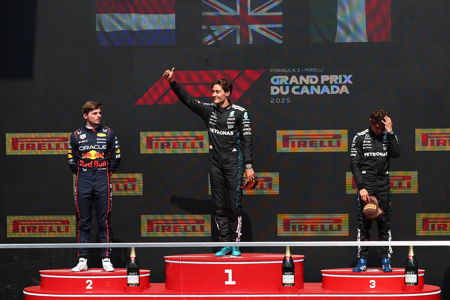 It's amazing to be back on the top step' – George Russell jubilant after  hard-fought victory in Canada | Formula 1®