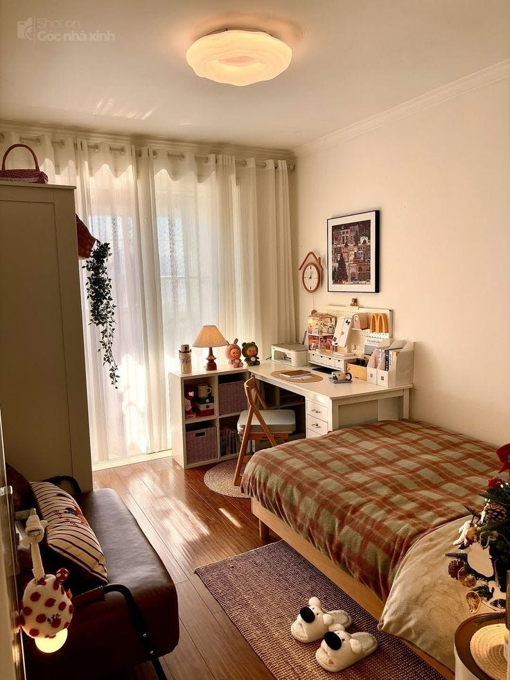 This may contain: the bedroom is clean and ready to be used as a home office or study area