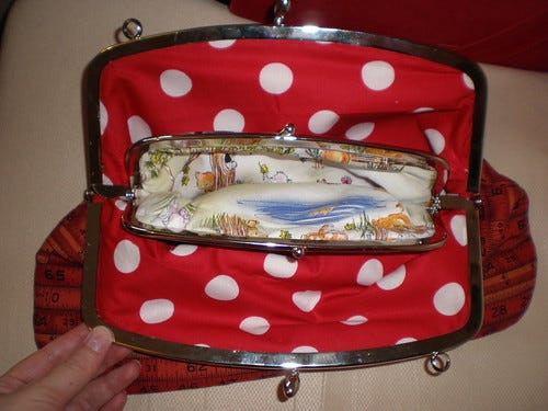 Metal frame snap purse lining Metal frame snap purse lining