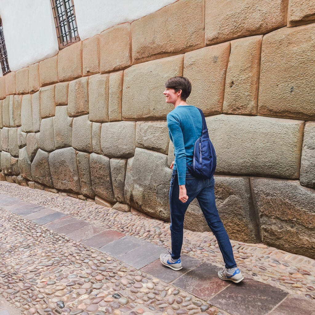 Walking by Inca foundation stones Walking by Inca foundation stones