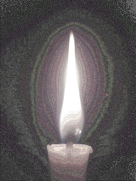 A close-up of a candle

Description automatically generated