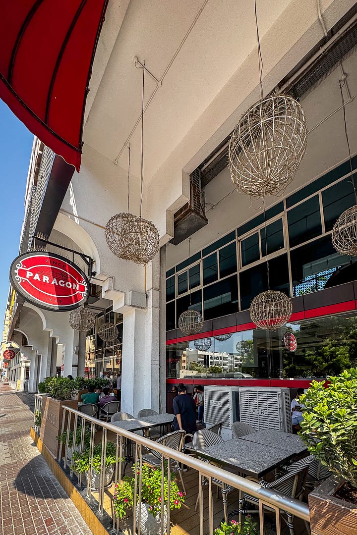 Calicut Paragon from the outside and just one of the restaurant rooms.