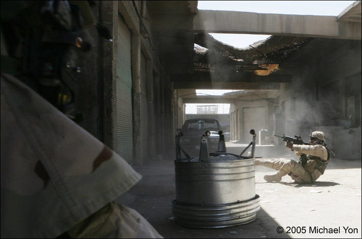 …and fights, as more bullets kick up dust.