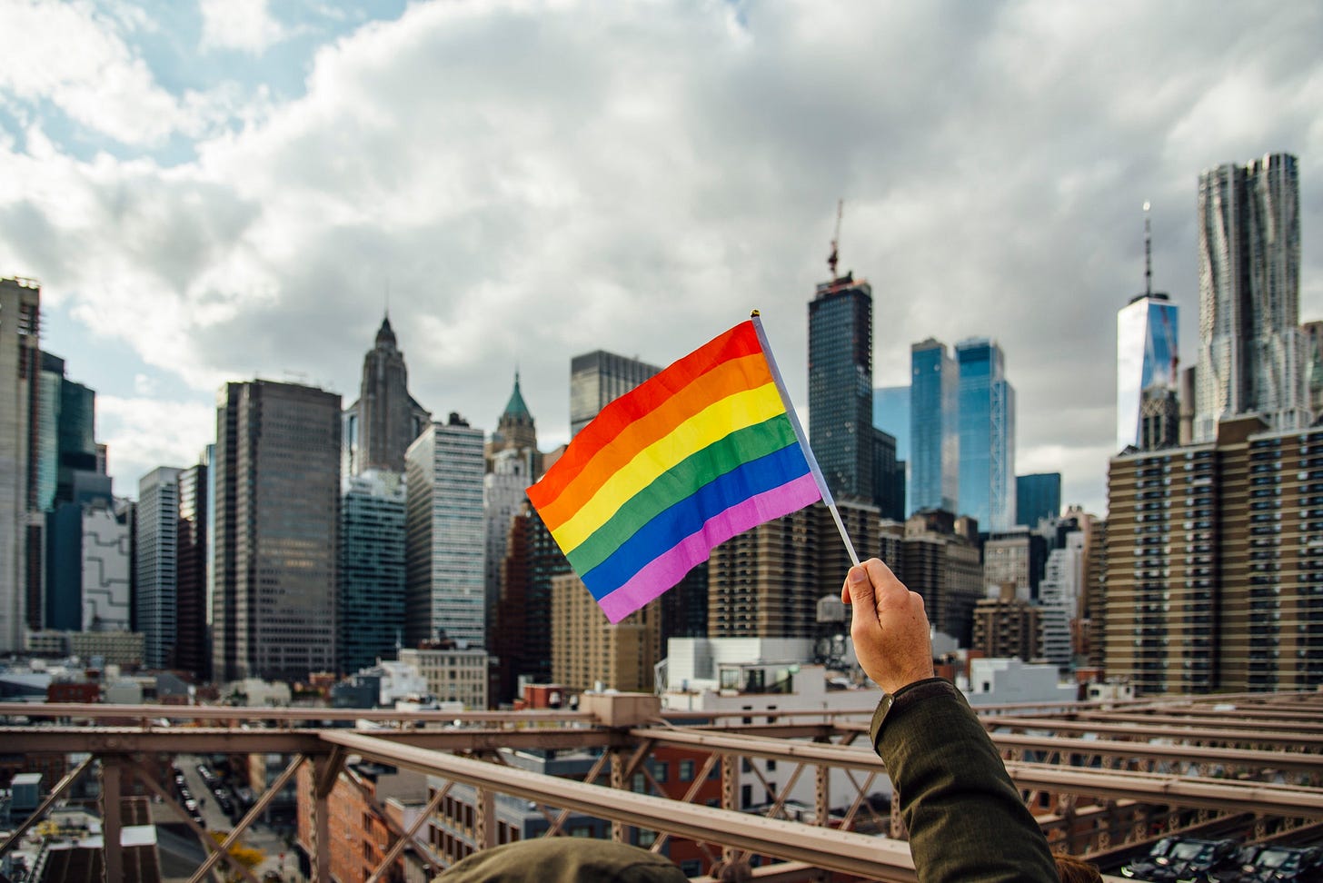 Pride flag with New York  skyline in the background