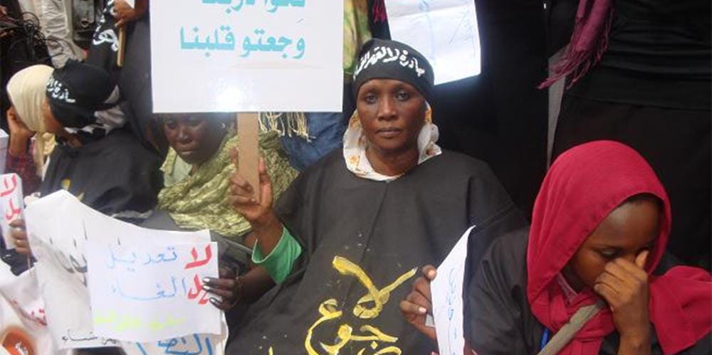 Women at a "No to Women's Oppression" rally protesting Sudan's public order laws, in solidarity with journalist Lubna Hussein, who was prosecuted for wearing trousers. © August 2009 Private Women at a "No to Women's Oppression" rally protesting Sudan's public order laws, in solidarity with journalist Lubna Hussein, who was prosecuted for wearing trousers. © August 2009 Private