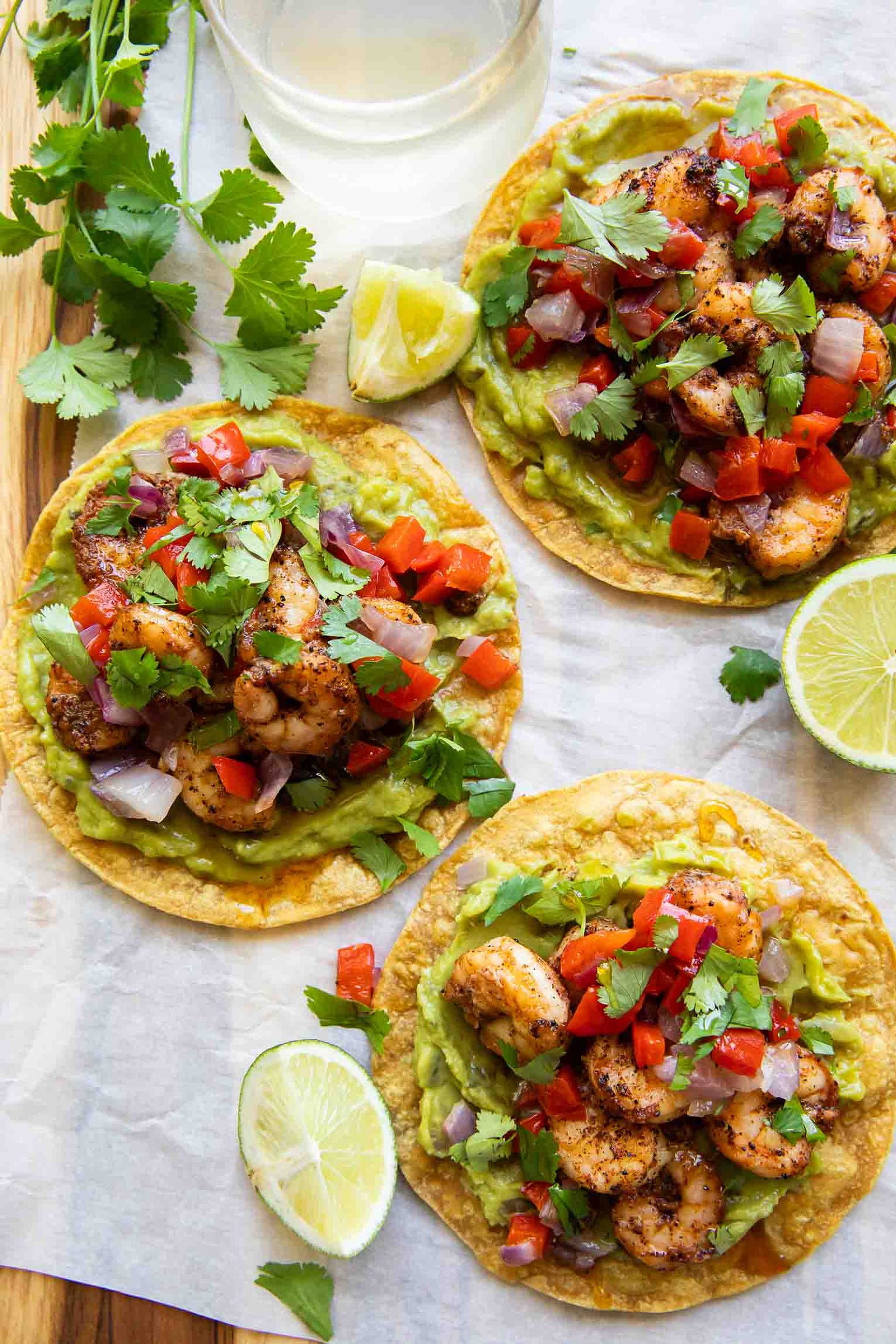 Three shrimp tostadas. 