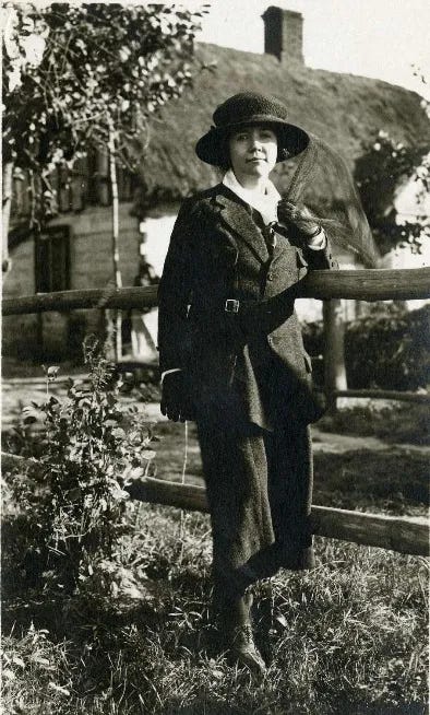 Rose Wilder Lane wearing a wool tweed travel suit in Brittany, France, circa 1921.