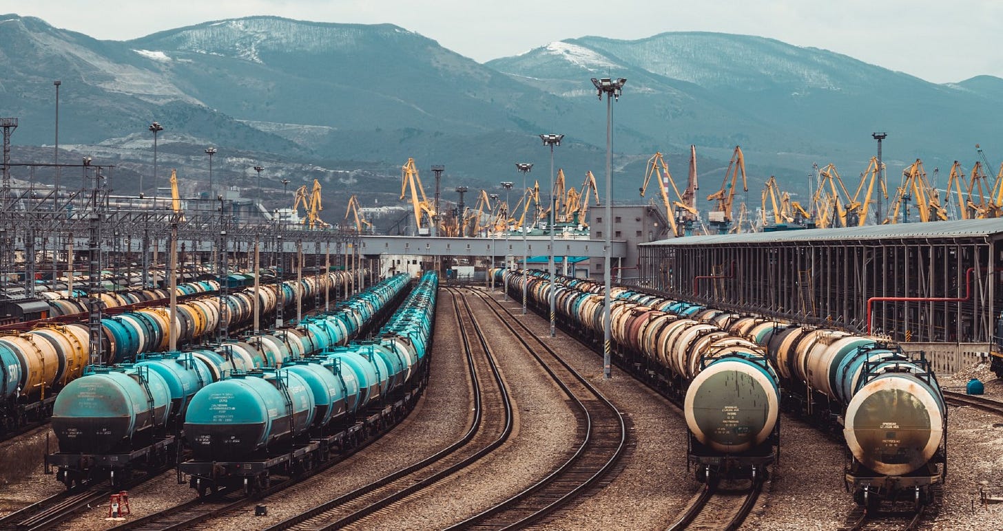 Railcars for liquid transport lined up at a port Railcars for liquid transport lined up at a port