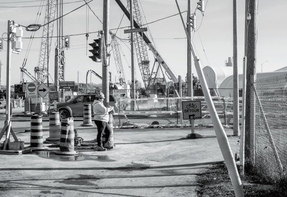 Part of photograph by Steven Evans of construction scene