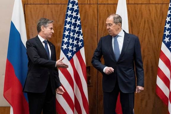 Two men shaking hands

Description automatically generated with medium confidence