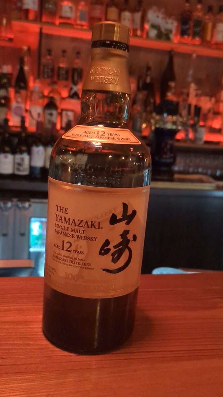 Dakaya ramen bowl, rare japanese whiskey at izakaya, internal shot of ceiling at izakaya