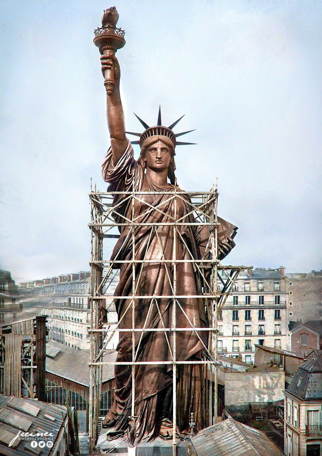 r/pics - The Statue of Liberty in Paris in 1886 before oxidation (colorized photo)