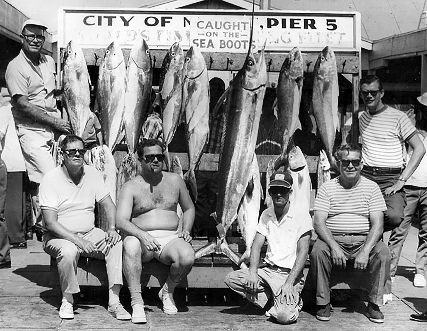 Figure 8: Buddy Carey and his crew and charter photographed with their catch in the 1970s. Courtesy of Captain James Sharpe Jr. Figure 8: Buddy Carey and his crew and charter photographed with their catch in the 1970s. Courtesy of Captain James Sharpe Jr.
