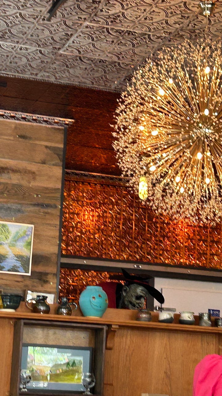 Photos of the entrance of Molley Chomper cidery.