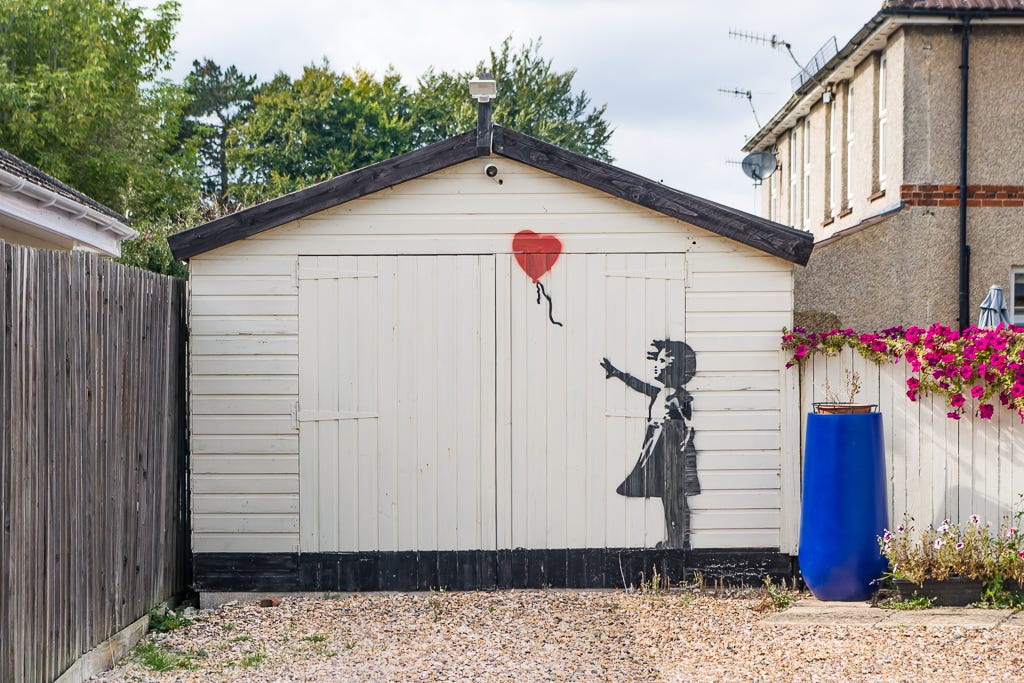 Banksy, Girl with Balloon, 2006. The motif painted as a mural in the United Kingdom; the 2006 canvas of the same image is the one that was shredded. Photograph: geograph.org.uk.