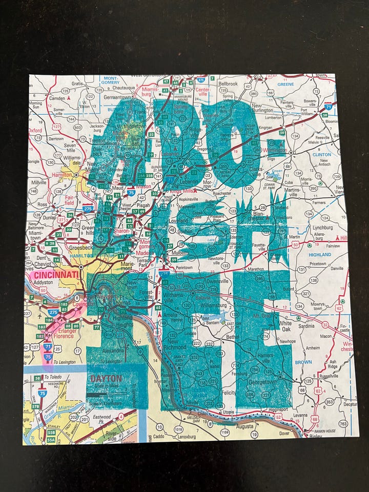 screen printed color ink posters with drawings on top