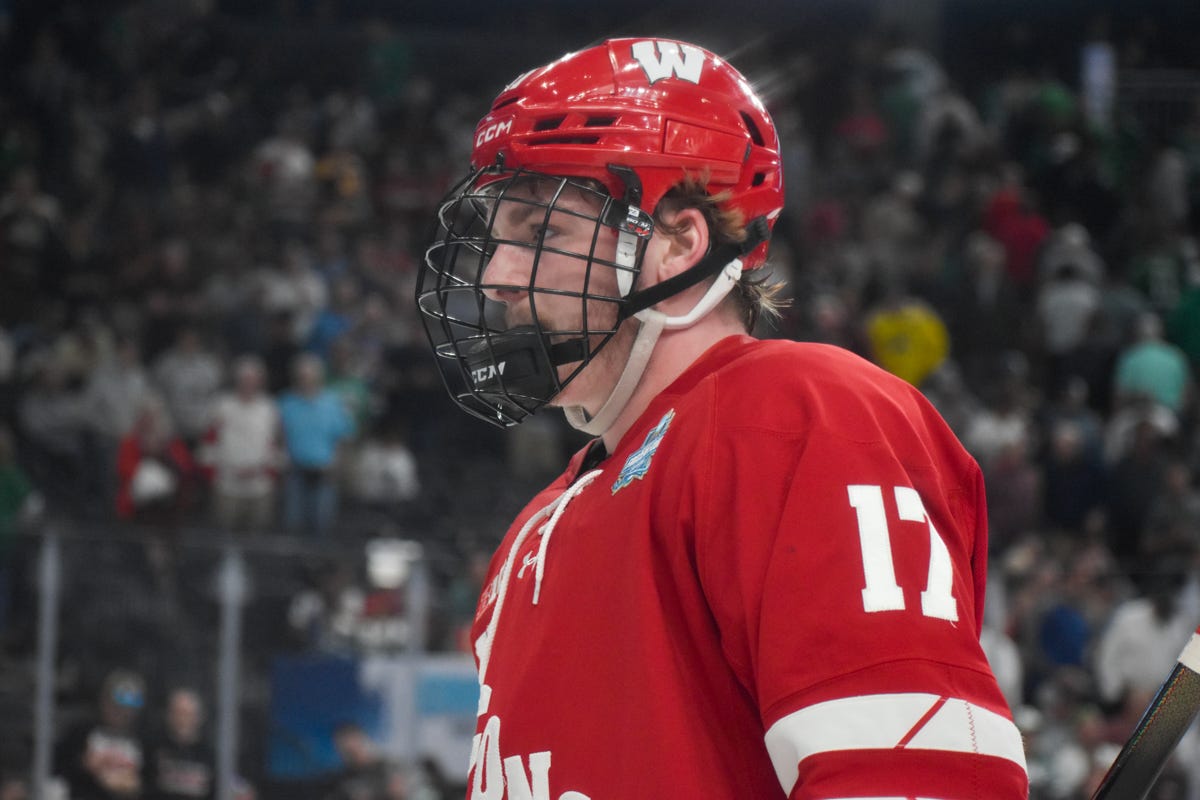 Grady Deering headshot with a crowd behind him