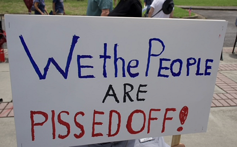 photo gallery of images from the 6/14 protest in Rock Hill showing signs and people