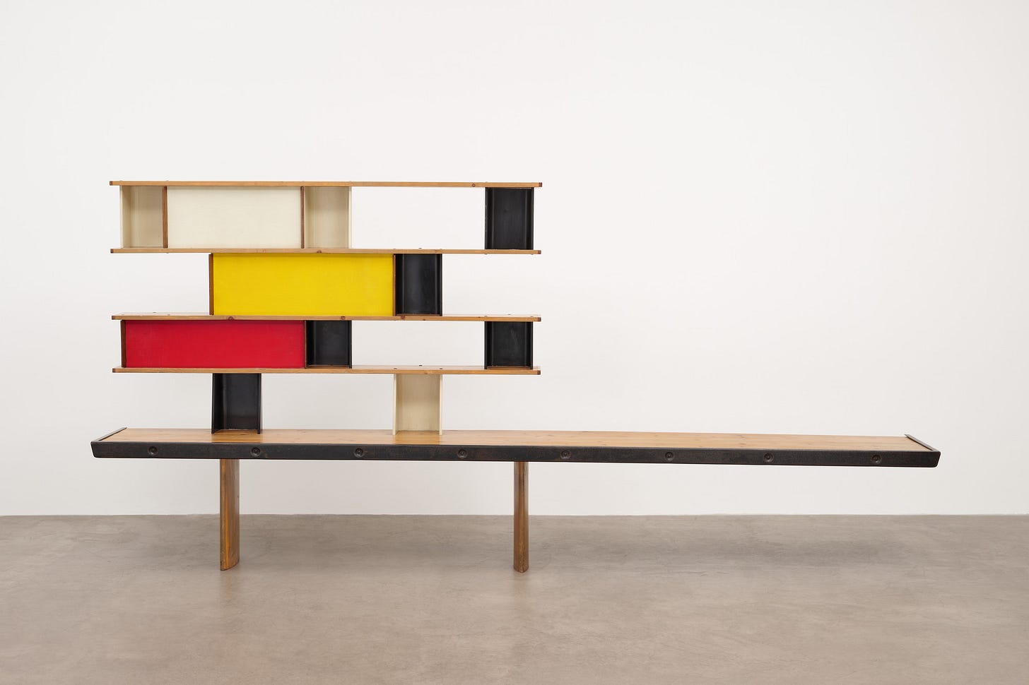 Charlotte Perriand, Maison de la Tunisie Bench-Bookshelf, (lacquered steel, aluminum, and pine), Ateliers Jean Prouvé, Nancy, 1952 [MoMA, New York, NY]